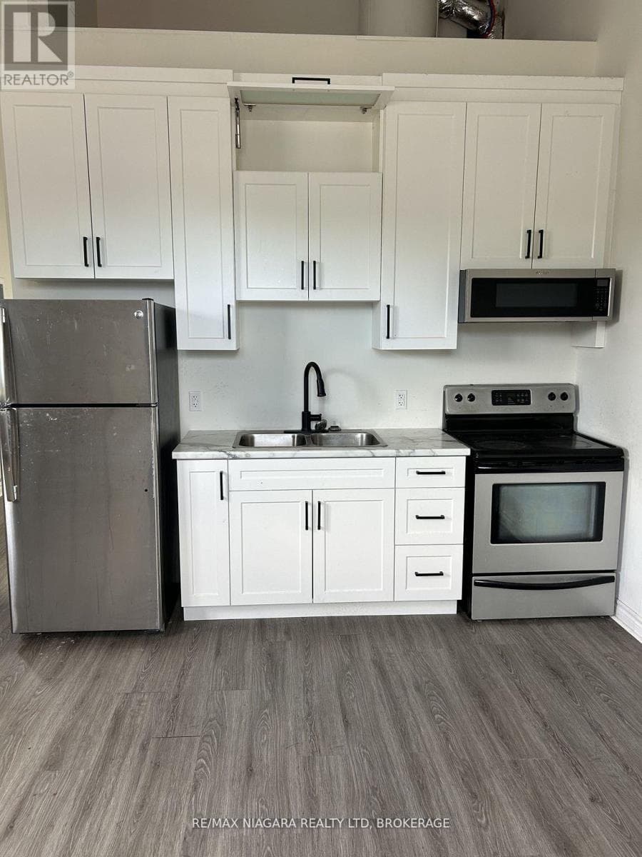 Single Family at 335 Wellington Street, Port Colborne (Killaly East), Ontario - Photo 6 - RE/MAX Garden City Realty