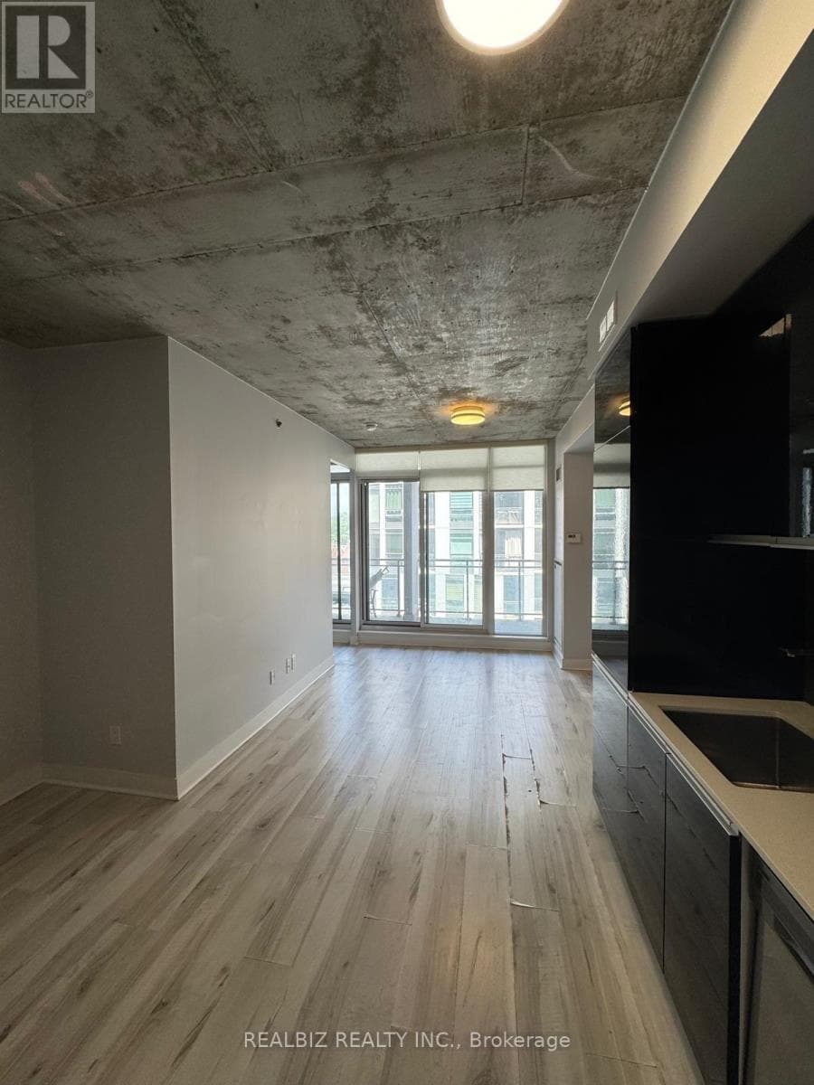 Single Family at 429- 20 Minowan Miikan Lane, Toronto (Little Portugal), Ontario - Photo 3 - RE/MAX Garden City Realty