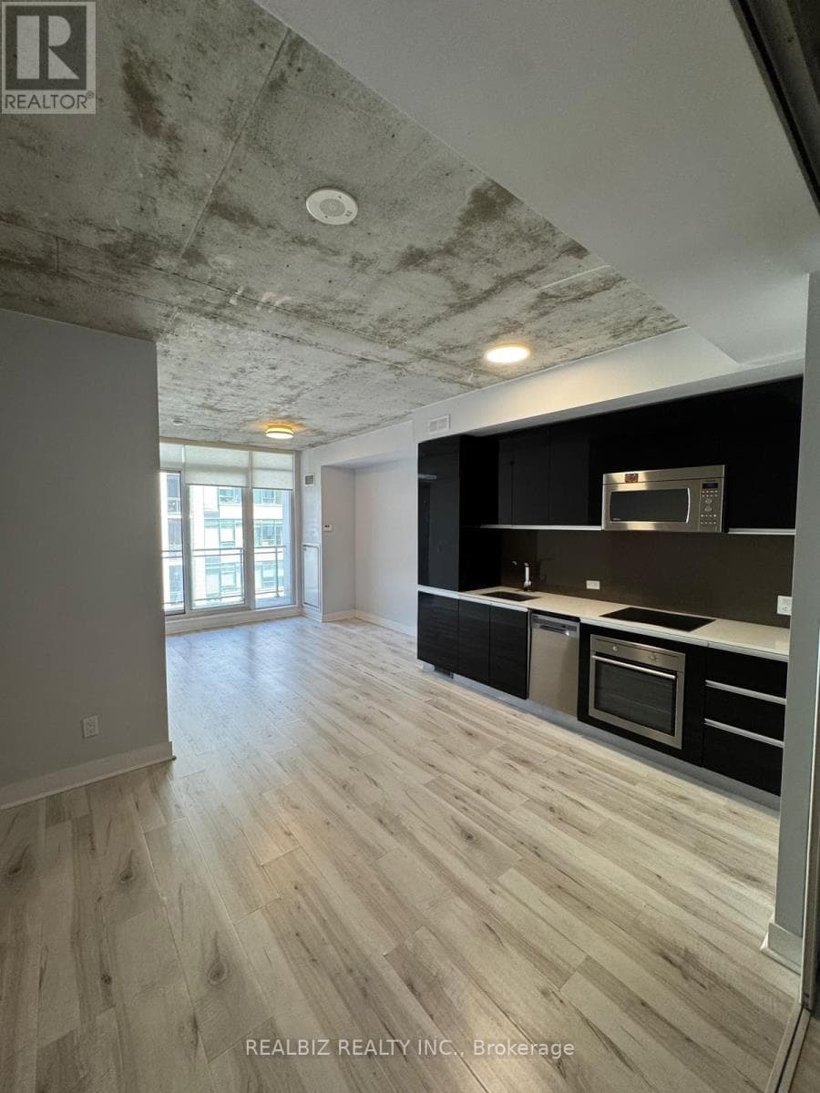 Single Family at 429- 20 Minowan Miikan Lane, Toronto (Little Portugal), Ontario - Photo 4 - RE/MAX Garden City Realty