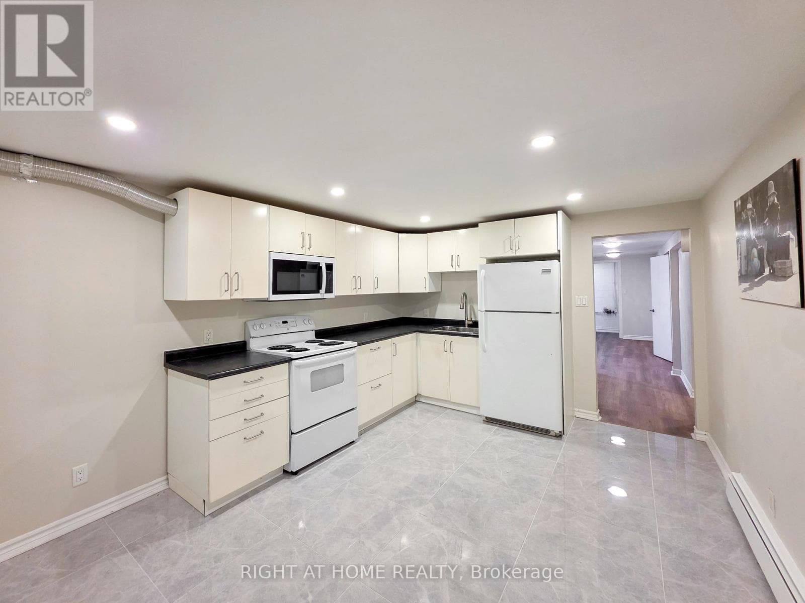 Single Family at Lower- 708 Carnegie Avenue, Oshawa (Centennial), Ontario - Photo 4 - RE/MAX Garden City Realty