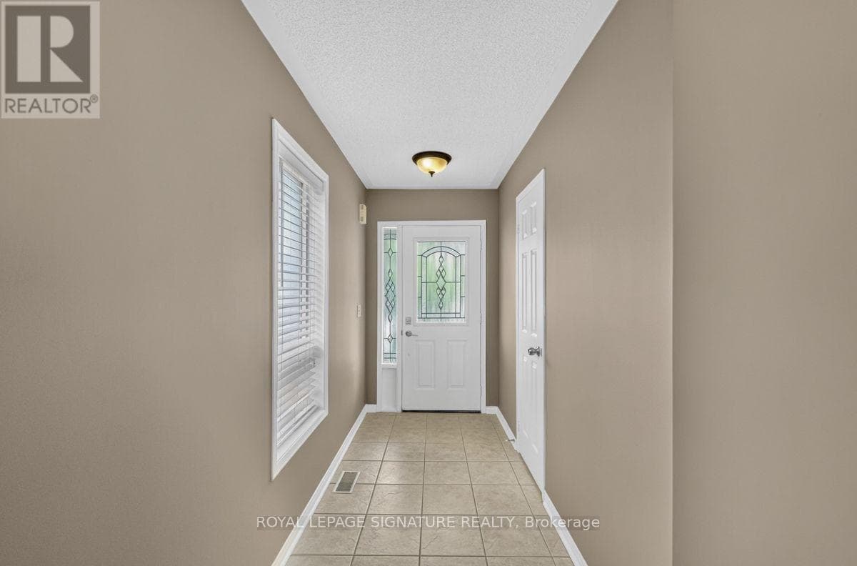 Single Family at 19 Mossgrove Crescent, Brampton (Northwest Sandalwood Parkway), Ontario - Photo 4 - RE/MAX Garden City Realty