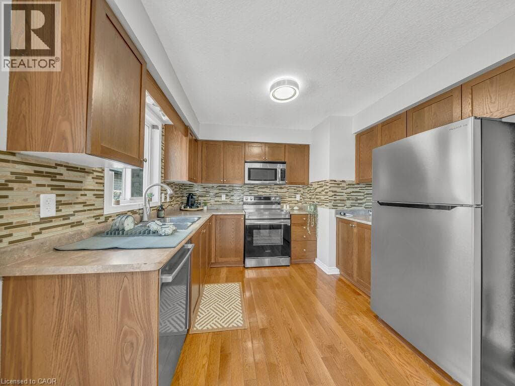 Single Family at 1369 OLD ZELLER Drive, Kitchener, Ontario - Photo 10 - RE/MAX Garden City Realty