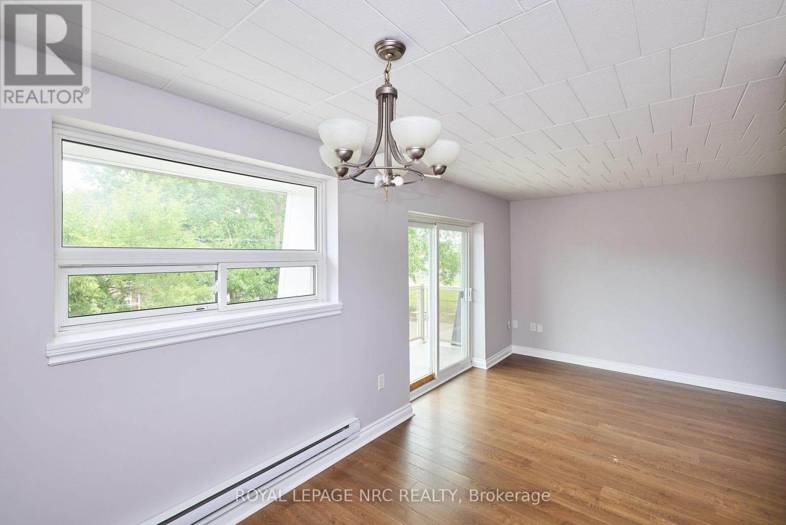 Multi-family at 11- 98 Woodlawn Road, Welland (N. Welland), Ontario - Photo 2 - RE/MAX Garden City Realty