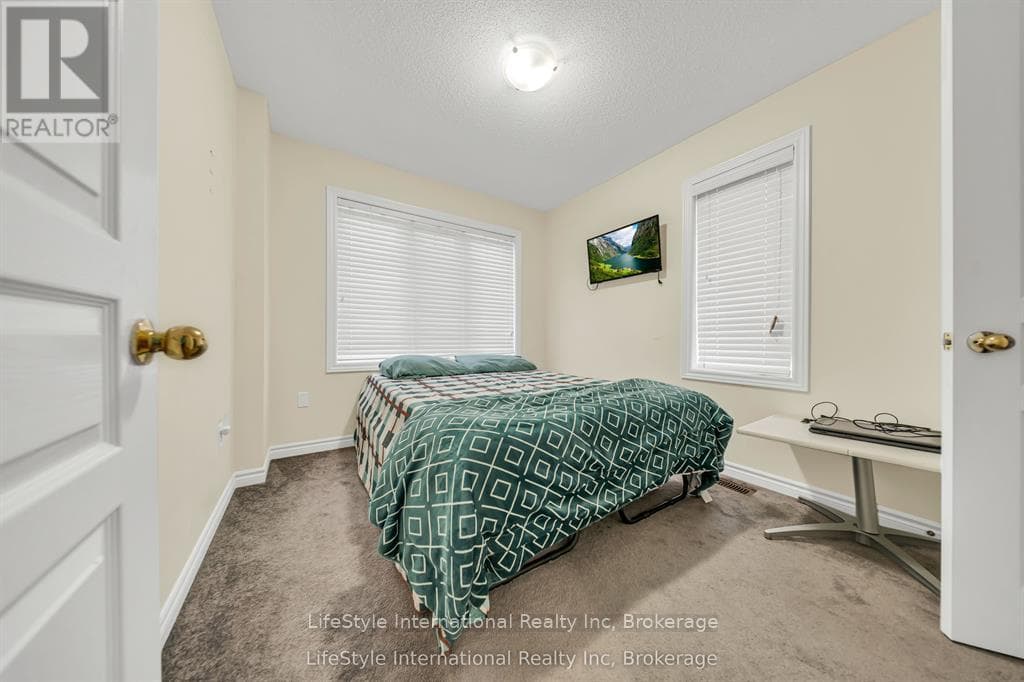 Single Family at 87- 88 Decorso Drive, Guelph (Kortright East), Ontario - Photo 10 - RE/MAX Garden City Realty