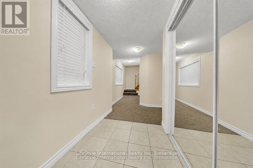 Single Family at 87- 88 Decorso Drive, Guelph (Kortright East), Ontario - Photo 2 - RE/MAX Garden City Realty