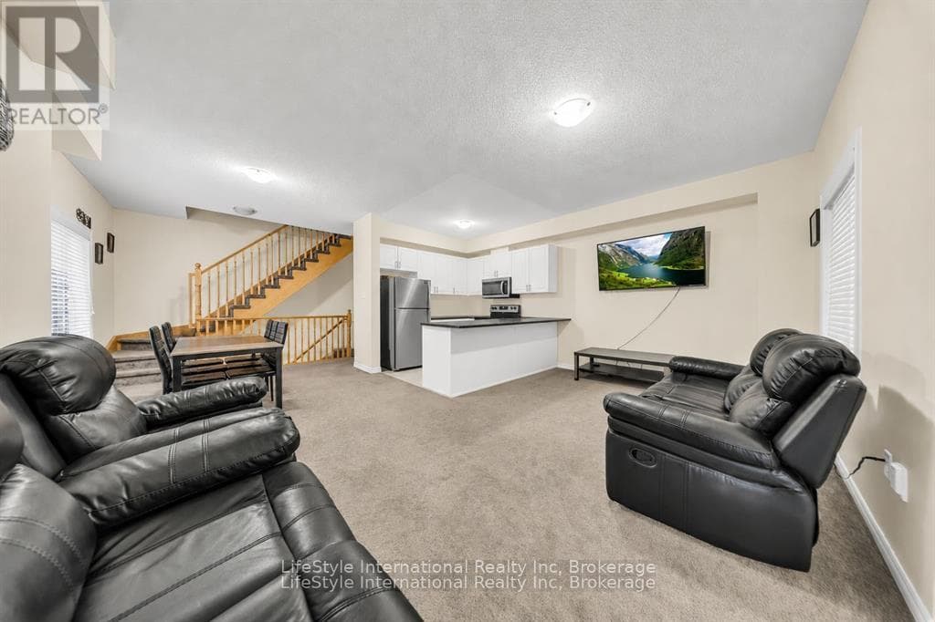 Single Family at 87- 88 Decorso Drive, Guelph (Kortright East), Ontario - Photo 4 - RE/MAX Garden City Realty