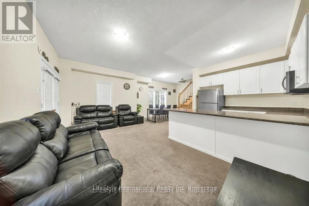 Single Family at 87- 88 Decorso Drive, Guelph (Kortright East), Ontario - Photo 5 - RE/MAX Garden City Realty