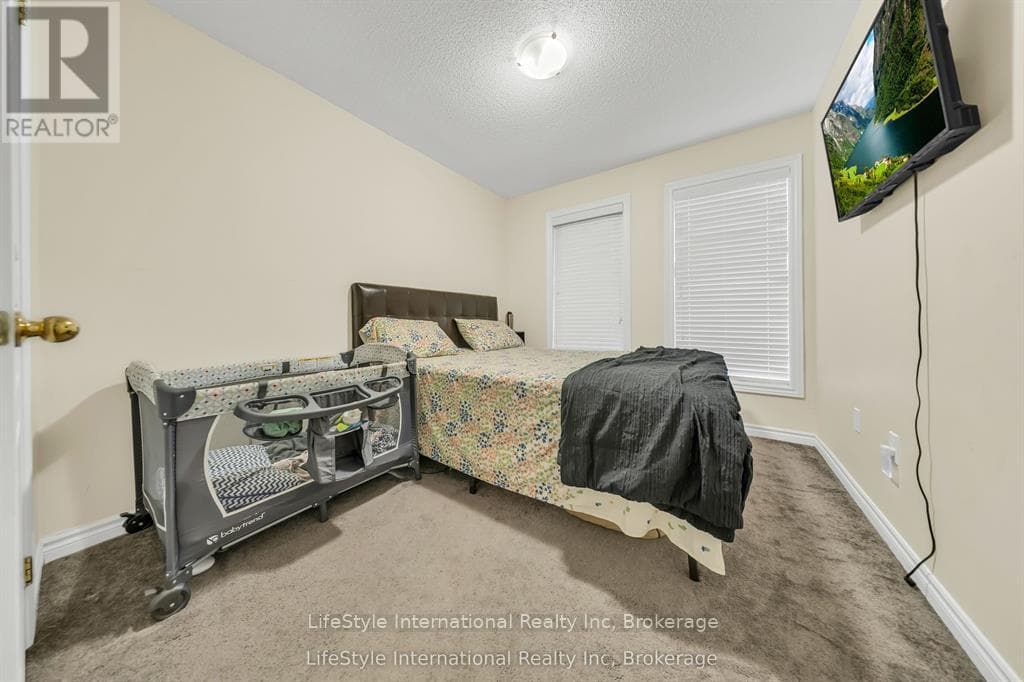 Single Family at 87- 88 Decorso Drive, Guelph (Kortright East), Ontario - Photo 9 - RE/MAX Garden City Realty