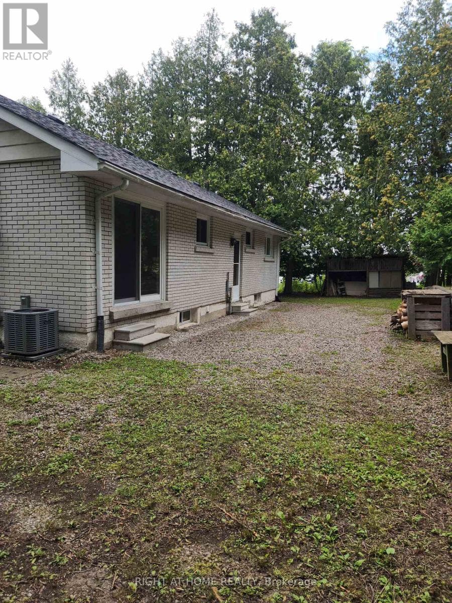 Single Family at 1023 Carson Road, Springwater (Midhurst), Ontario - Photo 2 - RE/MAX Garden City Realty