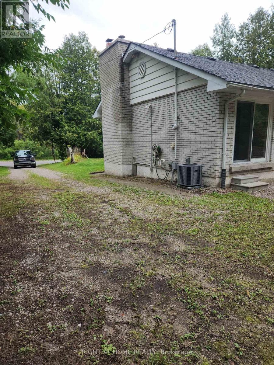 Single Family at 1023 Carson Road, Springwater (Midhurst), Ontario - Photo 3 - RE/MAX Garden City Realty