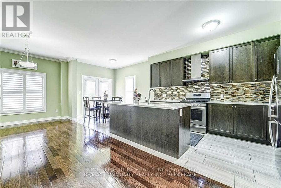 Single Family at 84 Wimbledon Court, Whitby (Williamsburg), Ontario - Photo 7 - RE/MAX Garden City Realty