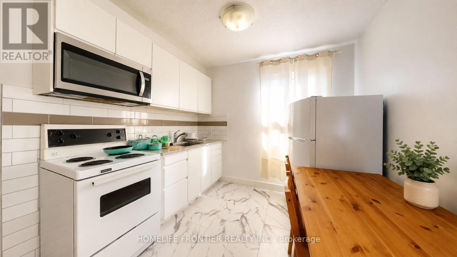 Multi-family at 4- 1110 Weston Road, Toronto (Mount Dennis), Ontario - Photo 4 - RE/MAX Garden City Realty