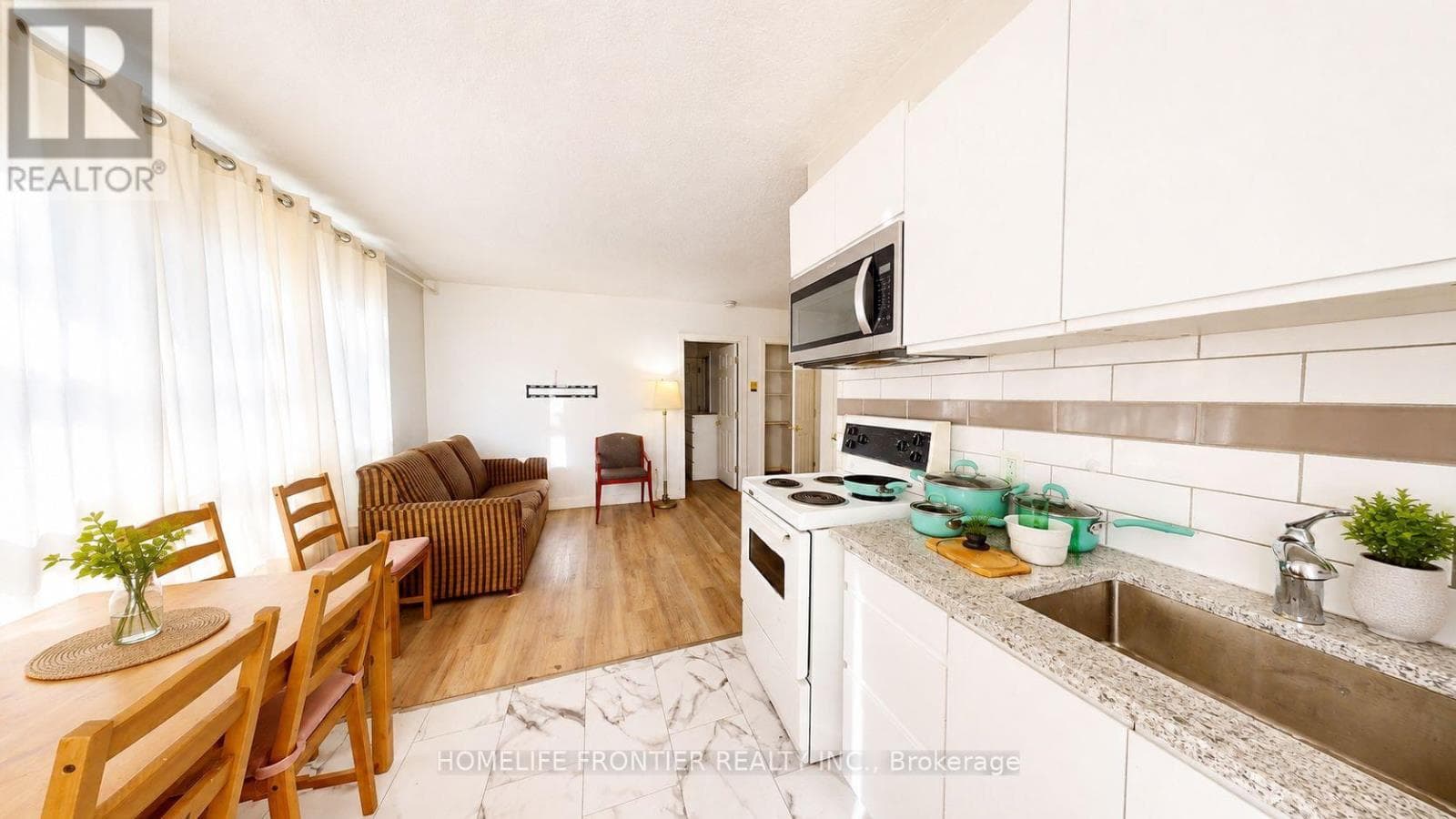 Multi-family at 4- 1110 Weston Road, Toronto (Mount Dennis), Ontario - Photo 3 - RE/MAX Garden City Realty