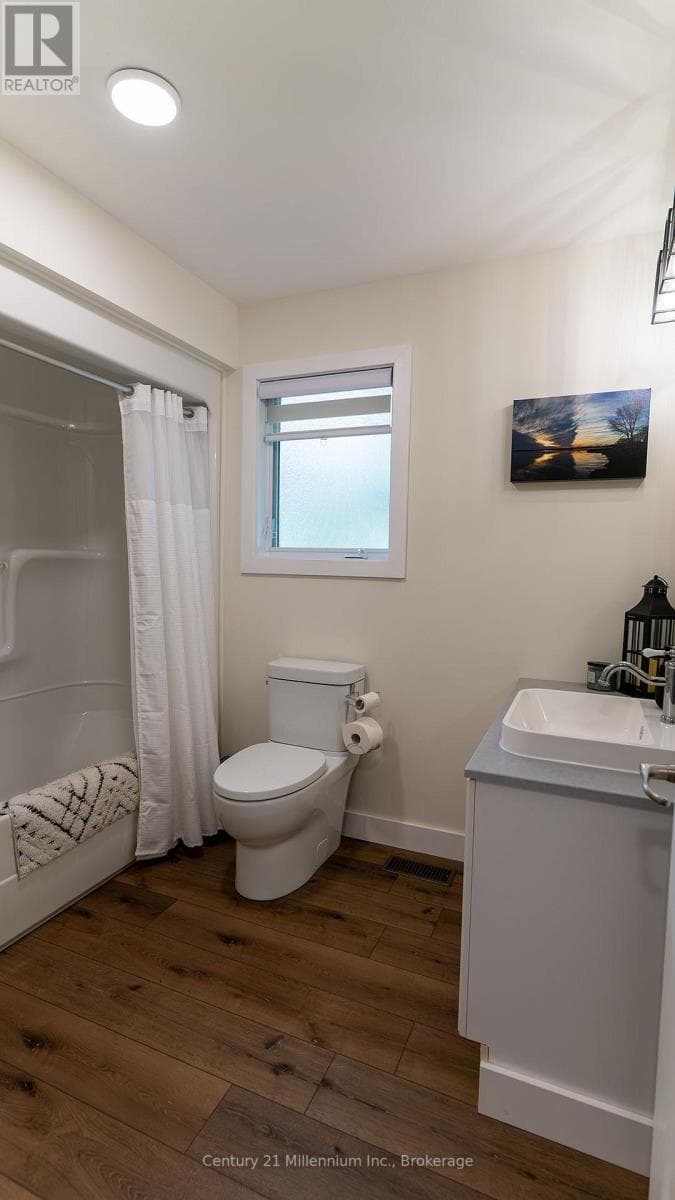 Single Family at 12 Illinois Crescent, Wasaga Beach, Ontario - Photo 6 - RE/MAX Garden City Realty