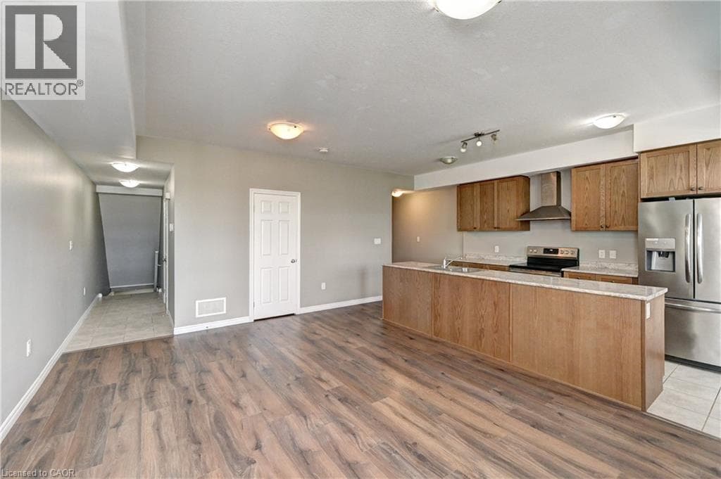 Single Family at 102 WHEAT Lane, Kitchener, Ontario - Photo 4 - RE/MAX Garden City Realty