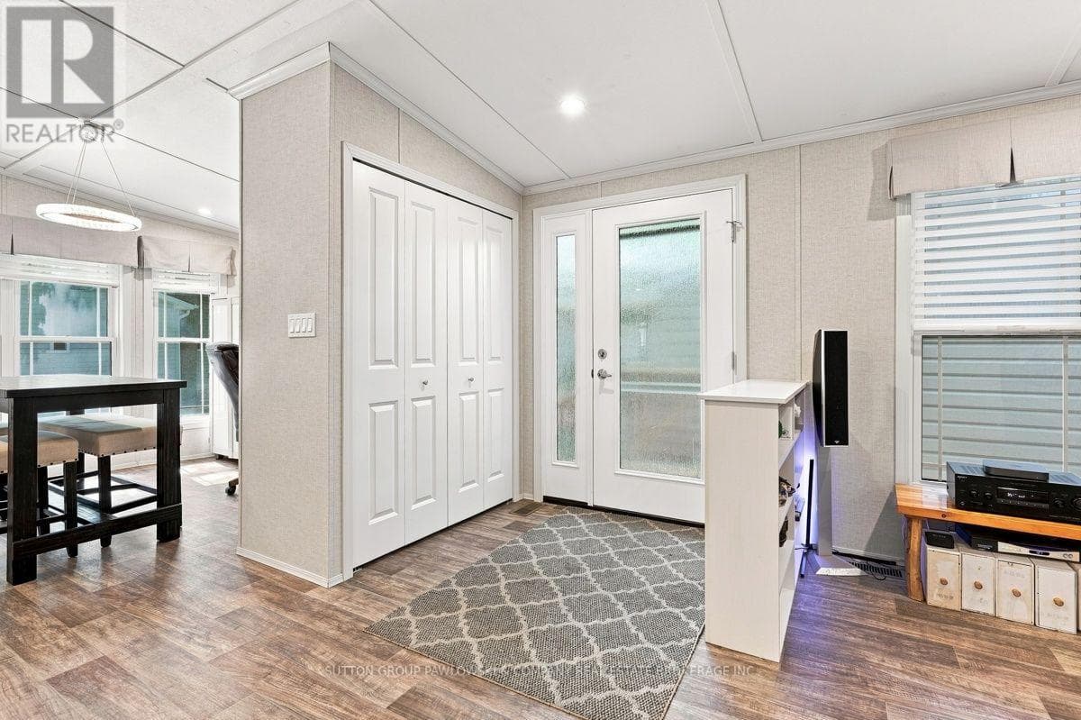 Single Family at 56- 22790 Amiens Road, Middlesex Centre (Komoka), Ontario - Photo 3 - RE/MAX Garden City Realty