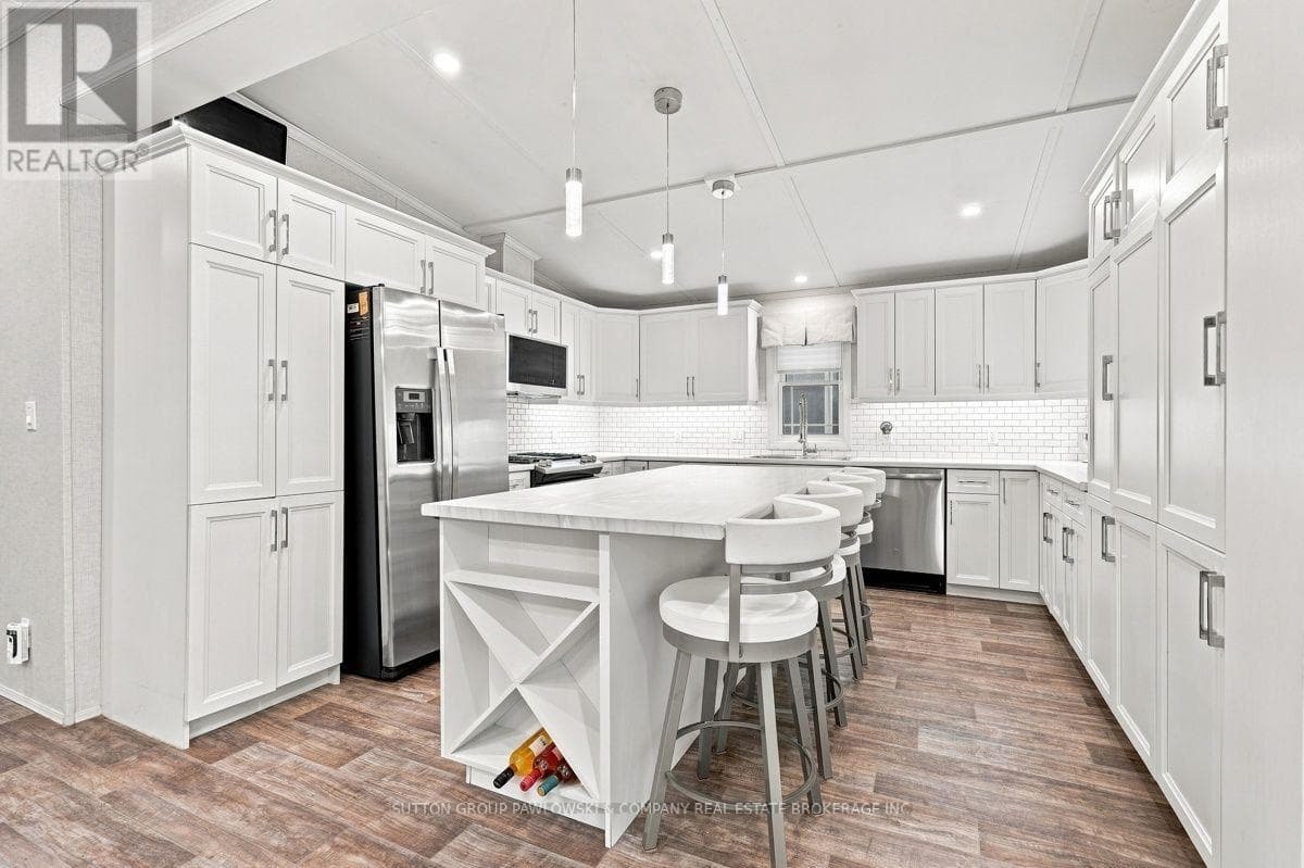 Single Family at 56- 22790 Amiens Road, Middlesex Centre (Komoka), Ontario - Photo 5 - RE/MAX Garden City Realty