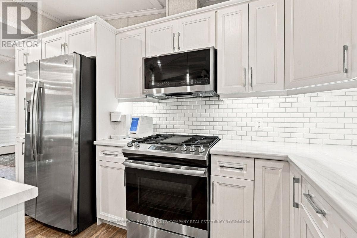 Single Family at 56- 22790 Amiens Road, Middlesex Centre (Komoka), Ontario - Photo 7 - RE/MAX Garden City Realty