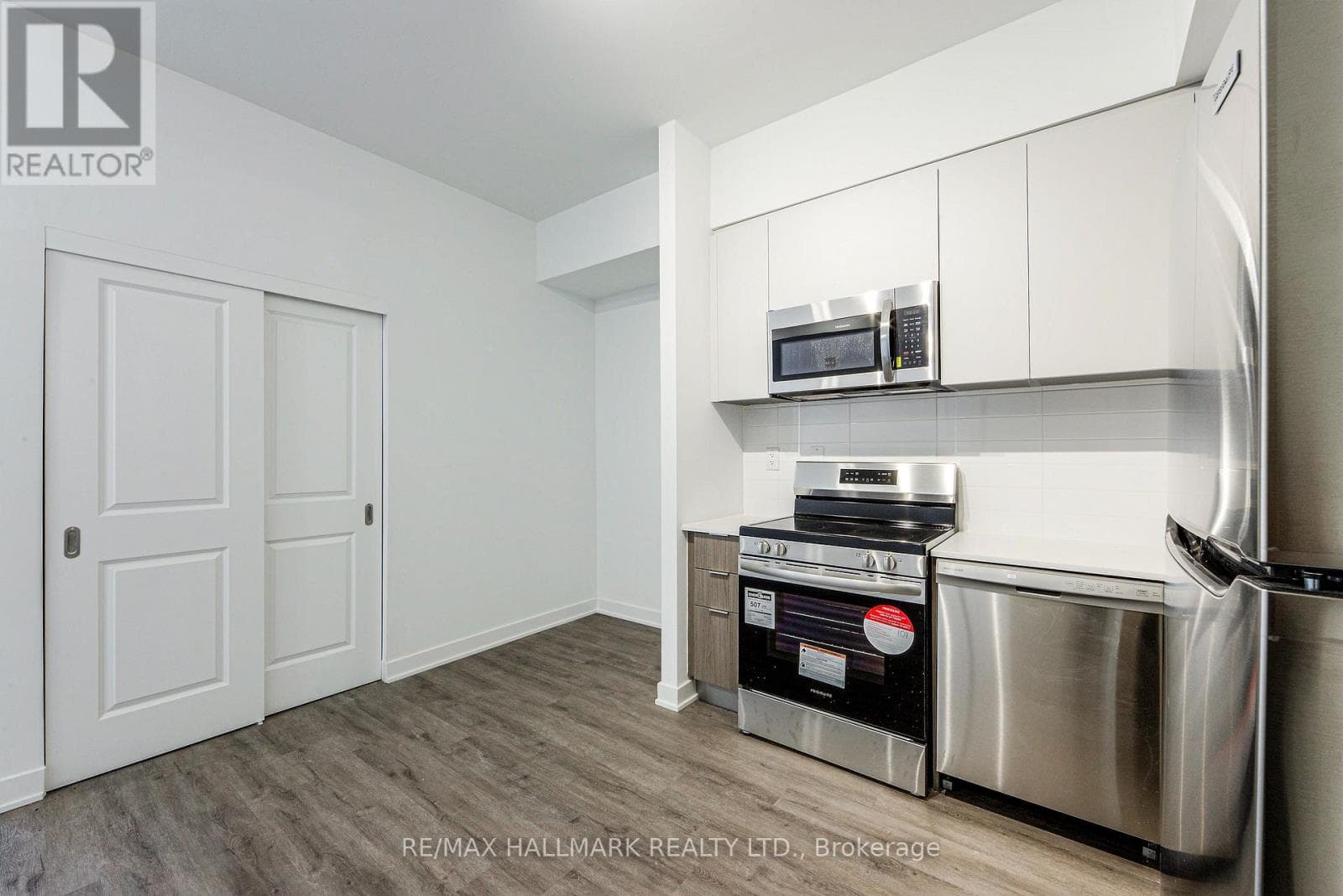 Single Family at 125- 37 Danforth Road, Toronto (Oakridge), Ontario - Photo 6 - RE/MAX Garden City Realty