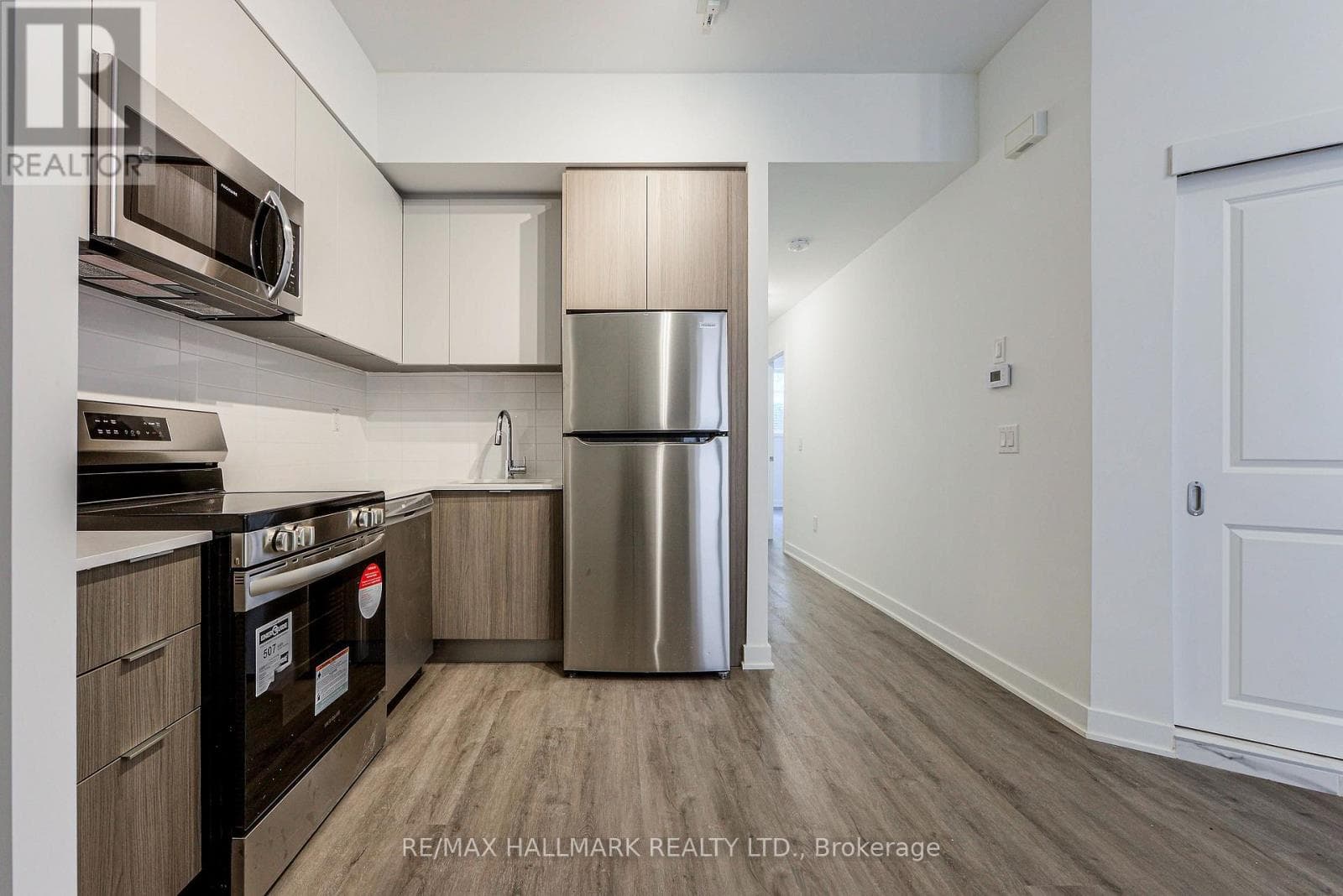 Single Family at 103- 35 Danforth Road, Toronto (Oakridge), Ontario - Photo 4 - RE/MAX Garden City Realty