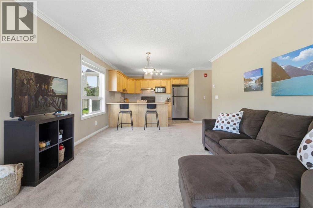 Single Family at 128 Centre Avenue, Cochrane, Alberta - Photo 6 - RE/MAX Garden City Realty