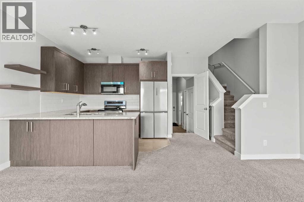 Single Family at 304 Jumping Pound Common, Cochrane, Alberta - Photo 8 - RE/MAX Garden City Realty
