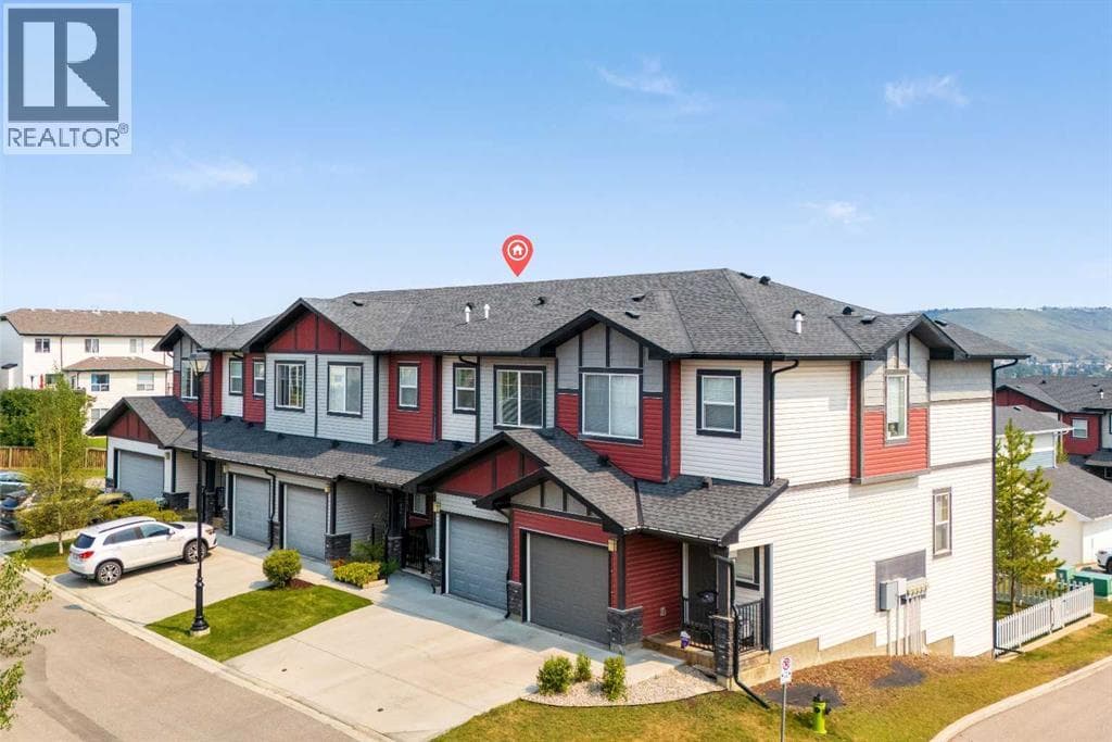 Single Family at 304 Jumping Pound Common, Cochrane, Alberta - Photo 2 - RE/MAX Garden City Realty