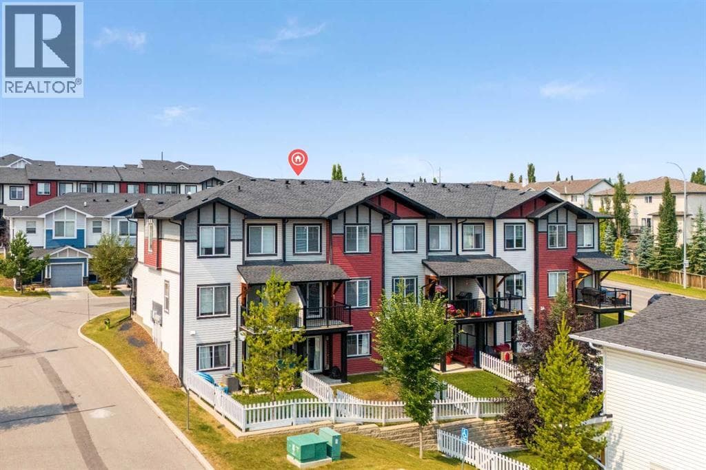 Single Family at 304 Jumping Pound Common, Cochrane, Alberta - Photo 3 - RE/MAX Garden City Realty