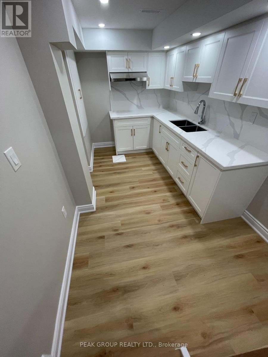 Single Family at Lower- 21 Keelson Street, Welland (Dain City), Ontario - Photo 4 - RE/MAX Garden City Realty