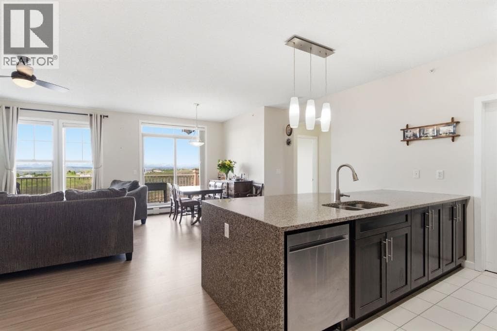 Single Family at 207 Sunset Drive, Cochrane, Alberta - Photo 10 - RE/MAX Garden City Realty