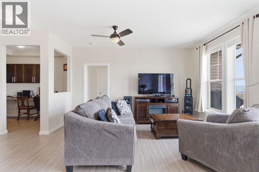 Single Family at 207 Sunset Drive, Cochrane, Alberta - Photo 5 - RE/MAX Garden City Realty