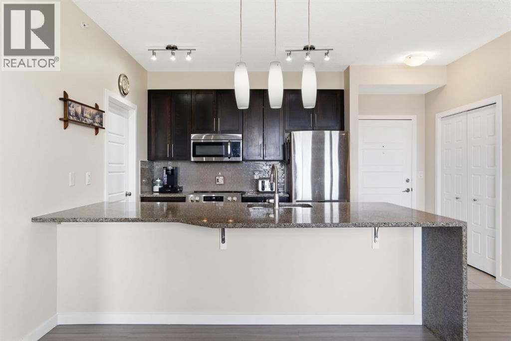 Single Family at 207 Sunset Drive, Cochrane, Alberta - Photo 6 - RE/MAX Garden City Realty