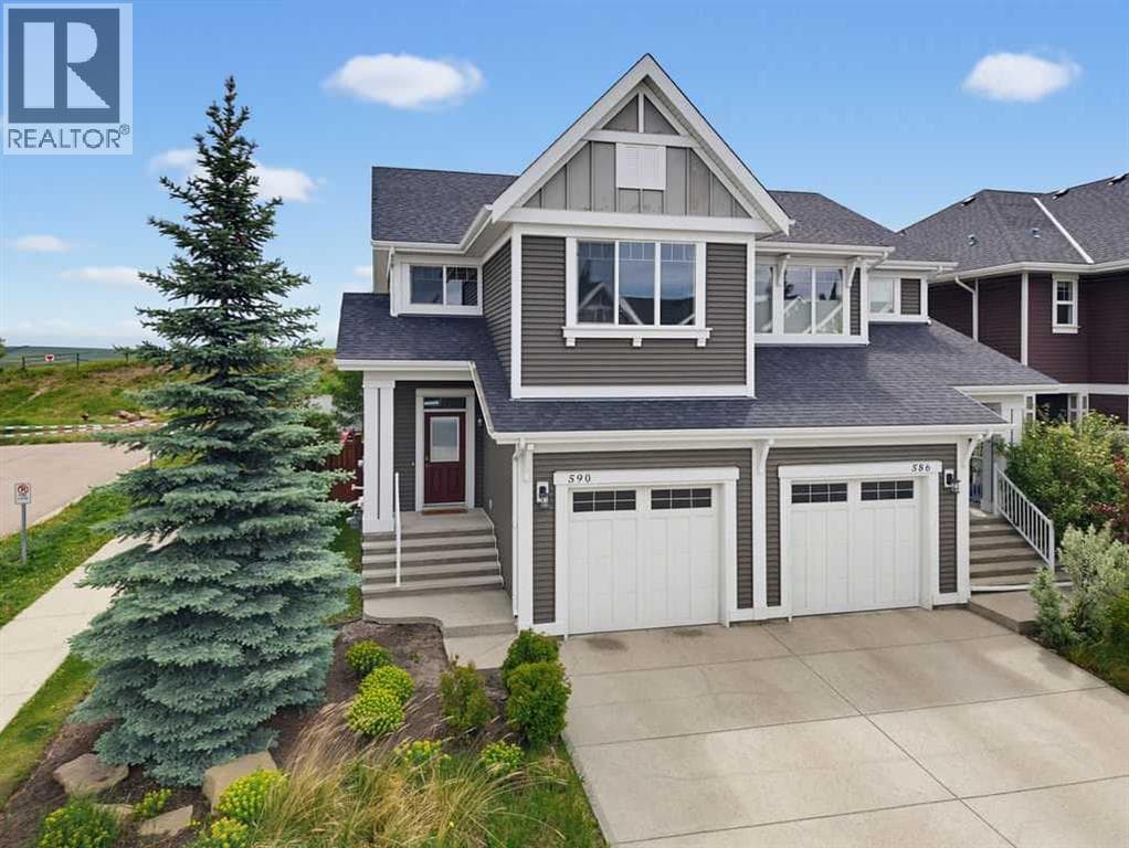 Single Family at 590 River Heights Crescent, Cochrane, Alberta - Photo 2 - RE/MAX Garden City Realty