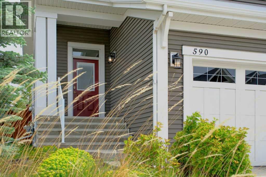 Single Family at 590 River Heights Crescent, Cochrane, Alberta - Photo 3 - RE/MAX Garden City Realty