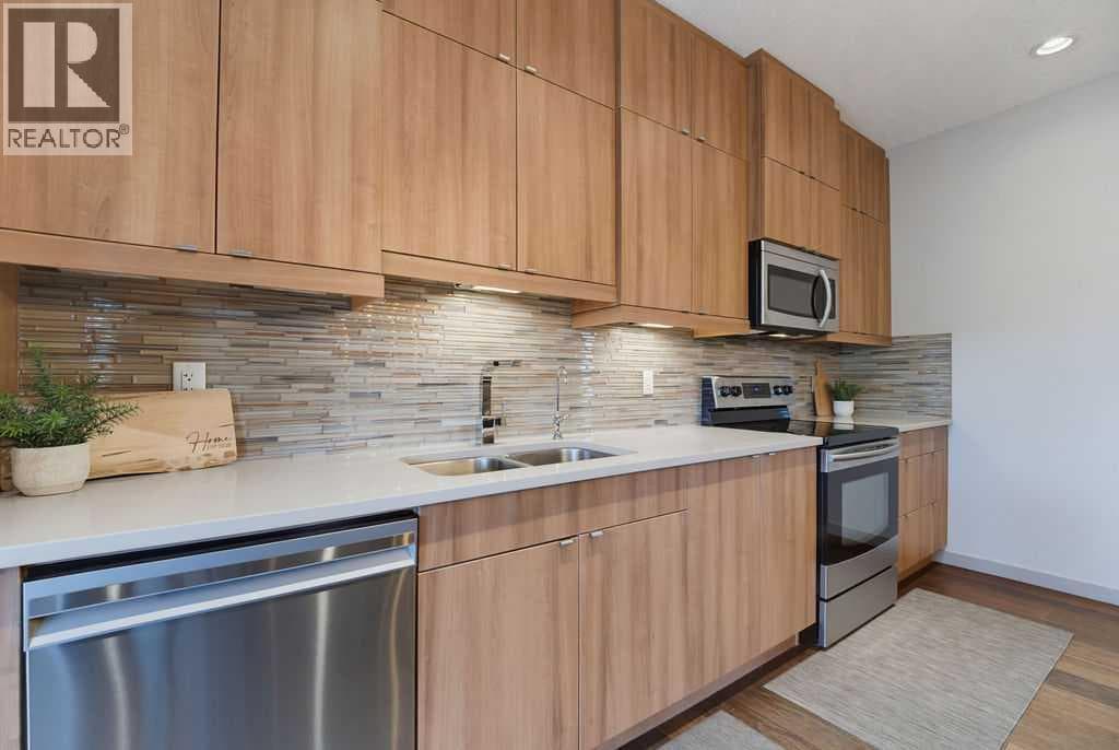 Single Family at 590 River Heights Crescent, Cochrane, Alberta - Photo 9 - RE/MAX Garden City Realty