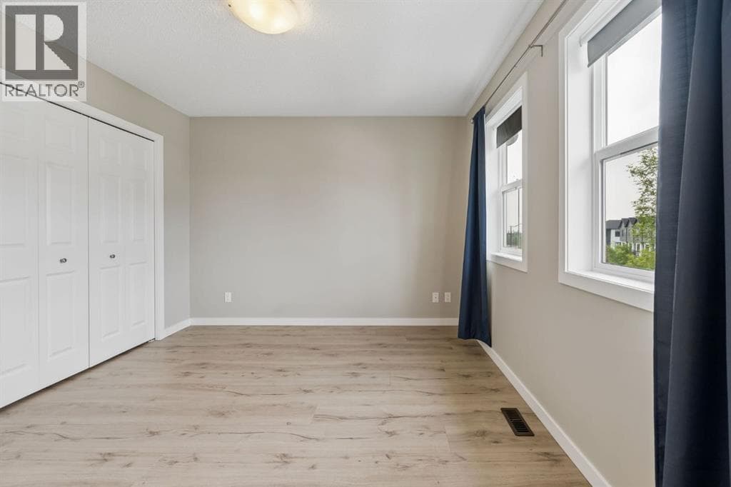 Single Family at 268 Sunset Road, Cochrane, Alberta - Photo 9 - RE/MAX Garden City Realty