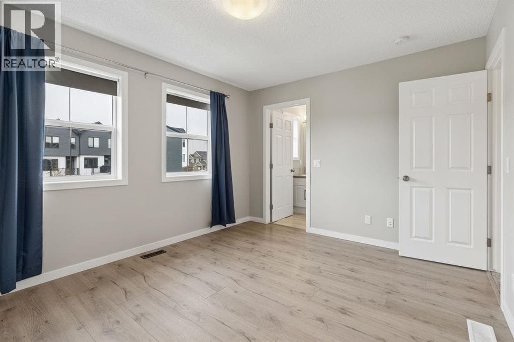 Single Family at 268 Sunset Road, Cochrane, Alberta - Photo 10 - RE/MAX Garden City Realty