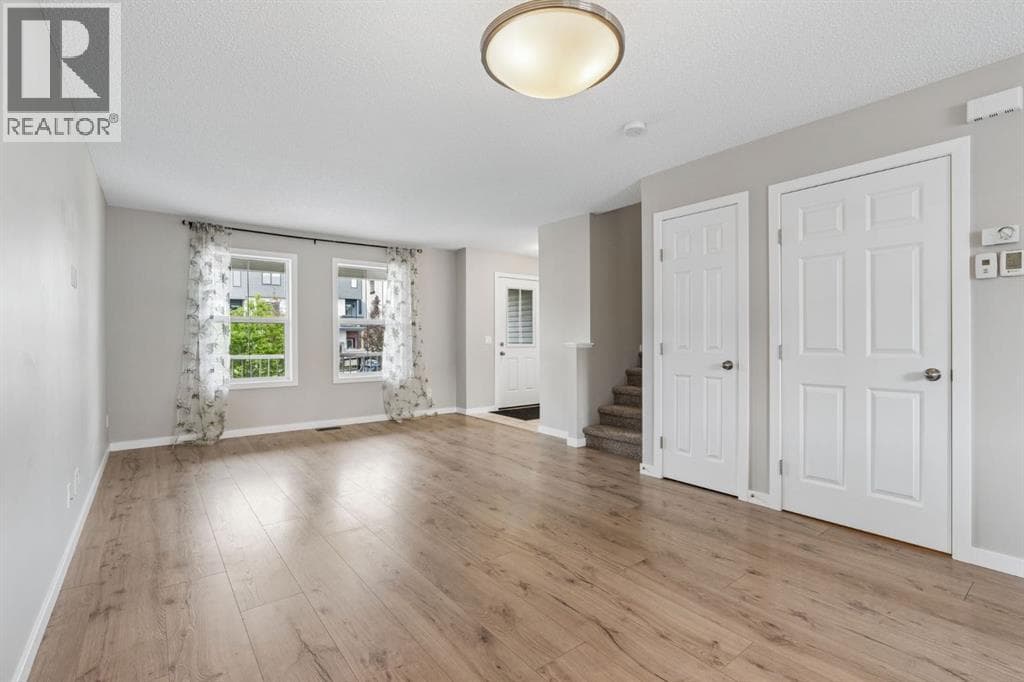 Single Family at 268 Sunset Road, Cochrane, Alberta - Photo 6 - RE/MAX Garden City Realty