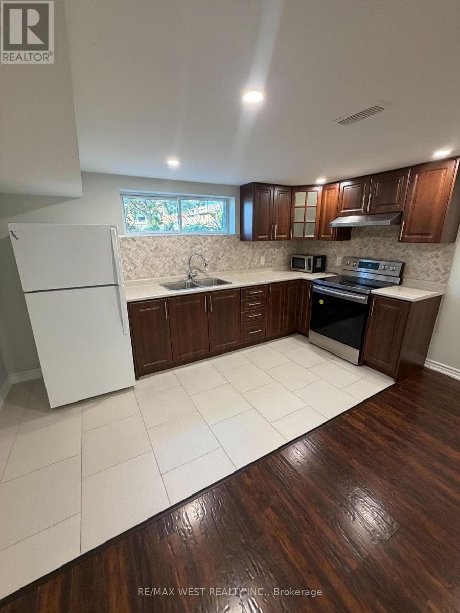 Single Family at 15 Macleod Street, Toronto (Maple Leaf), Ontario - Photo 4 - RE/MAX Garden City Realty