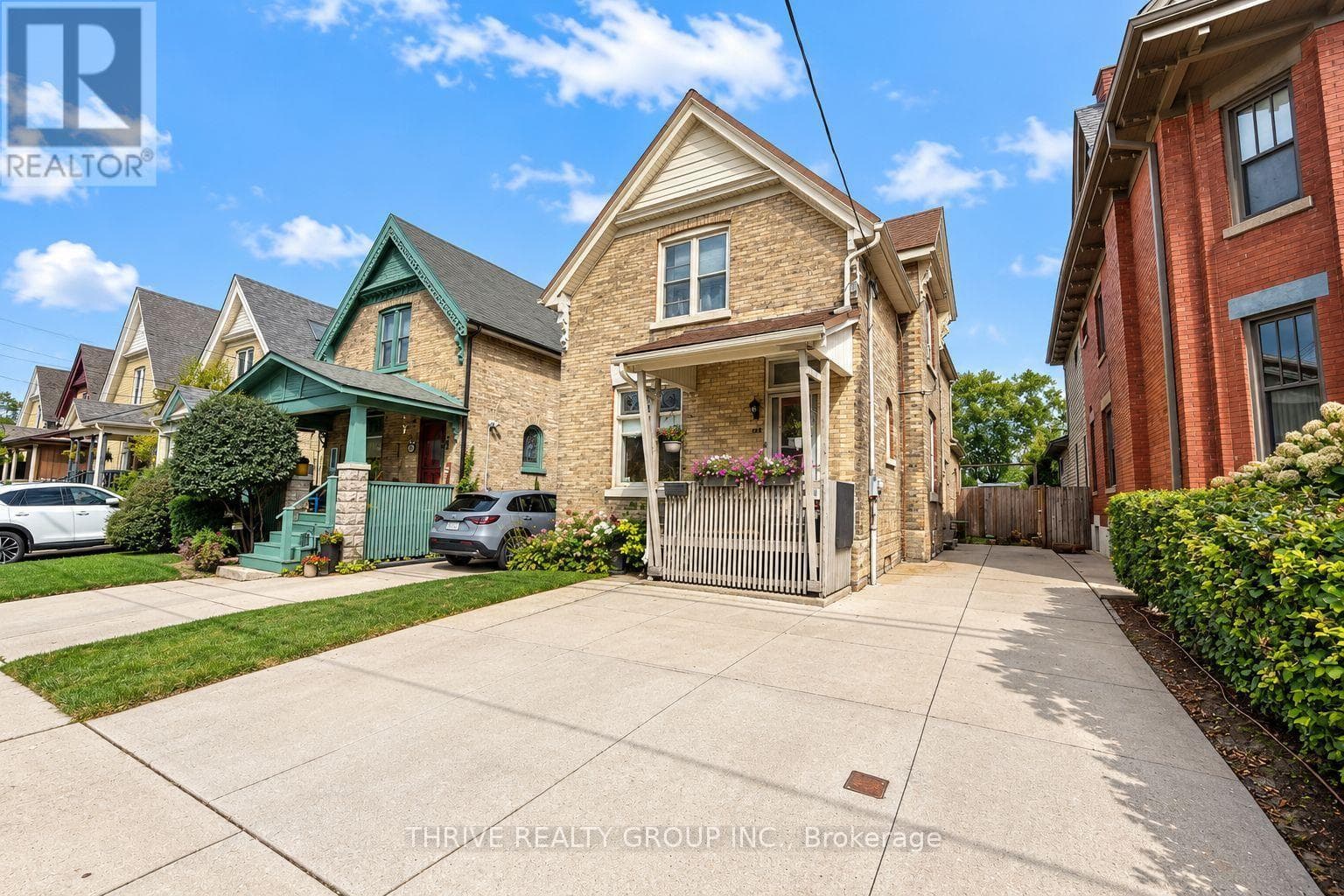 Upper- 162 Tecumseh Avenue