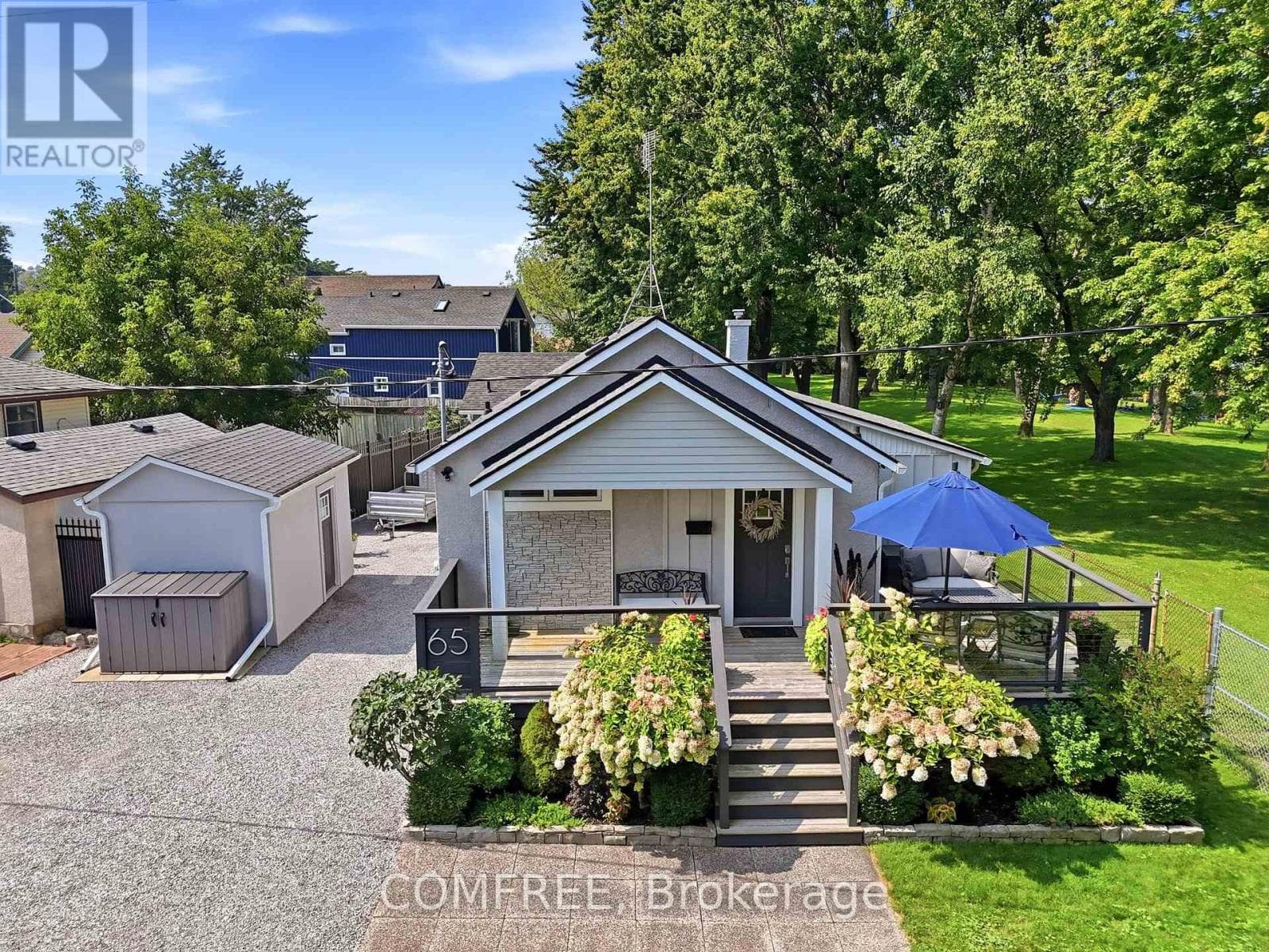 Single Family at 65 Bogart Street, St. Catharines (Port Weller), Ontario - Photo 2 - RE/MAX Garden City Realty