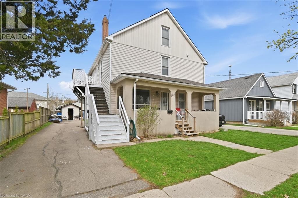 Multi-family at 307 WALLACE Avenue, Welland, Ontario - Photo 2 - RE/MAX Garden City Realty
