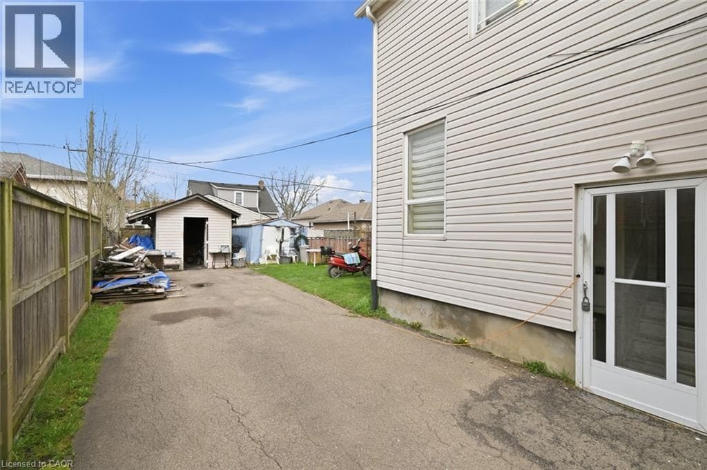 Multi-family at 307 WALLACE Avenue, Welland, Ontario - Photo 3 - RE/MAX Garden City Realty
