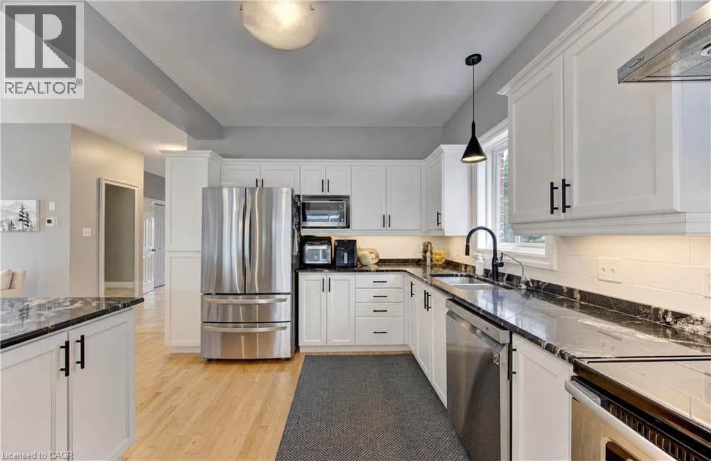 Single Family at 231 STEEPLERIDGE Street, Kitchener, Ontario - Photo 7 - RE/MAX Garden City Realty