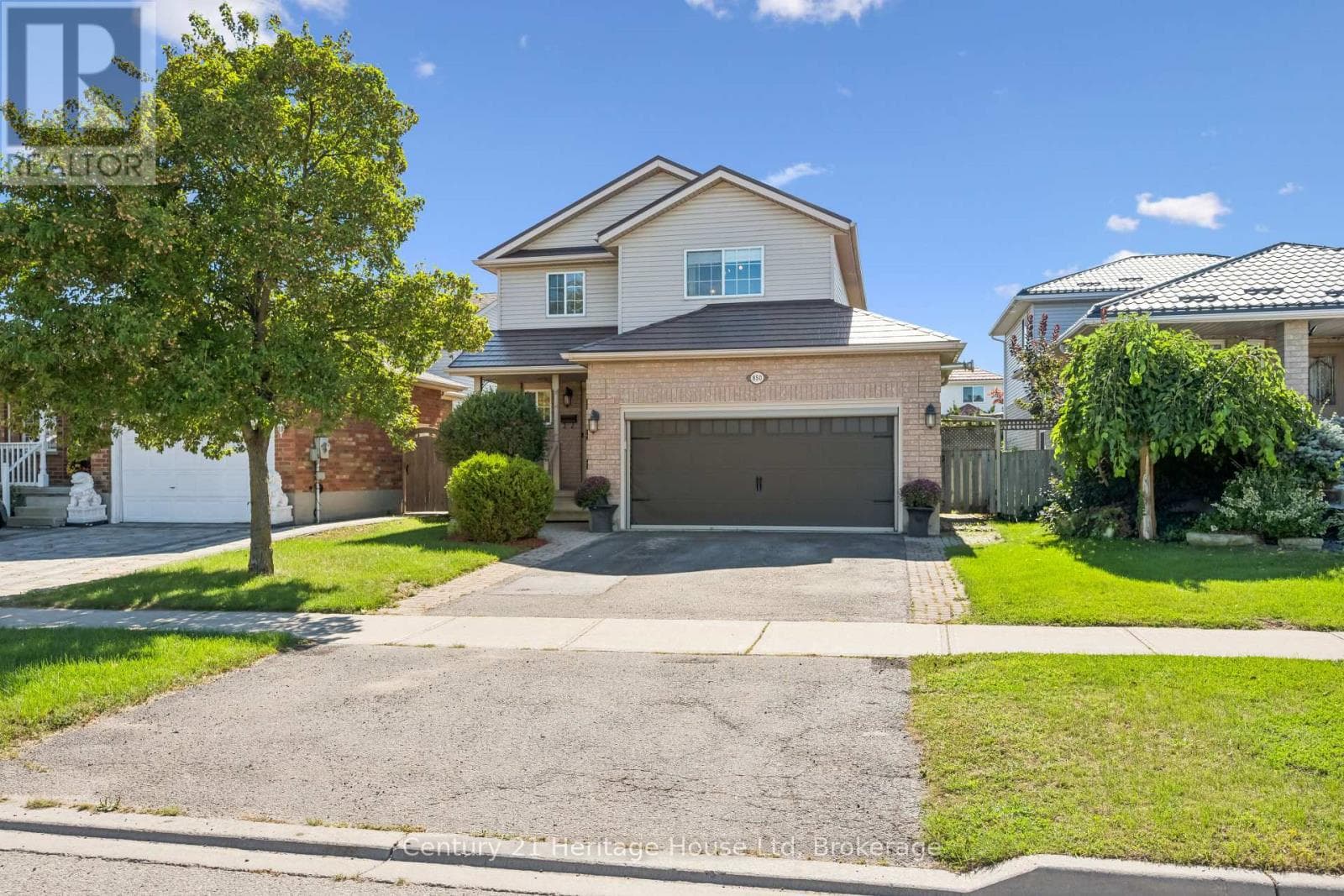 Single Family at 850 Paisley Road, Guelph (Willow West/Sugarbush/West Acres), Ontario - Photo 1 - RE/MAX Garden City Realty