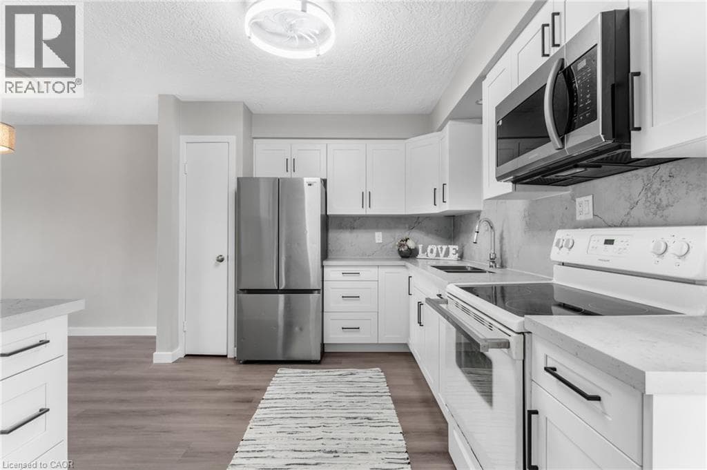 Single Family at 104 RALGREEN Crescent, Kitchener, Ontario - Photo 7 - RE/MAX Garden City Realty