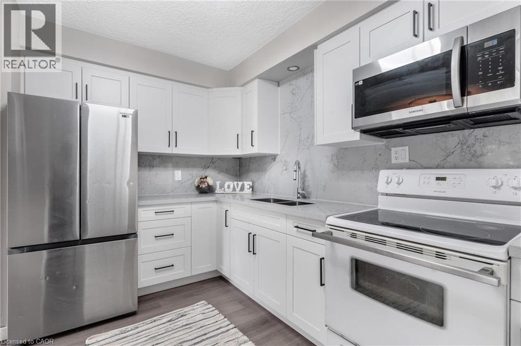 Single Family at 104 RALGREEN Crescent, Kitchener, Ontario - Photo 8 - RE/MAX Garden City Realty