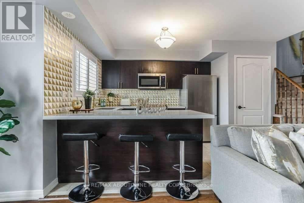 Single Family at 10- 2579 Sixth Line, Oakville (RO River Oaks), Ontario - Photo 7 - RE/MAX Garden City Realty