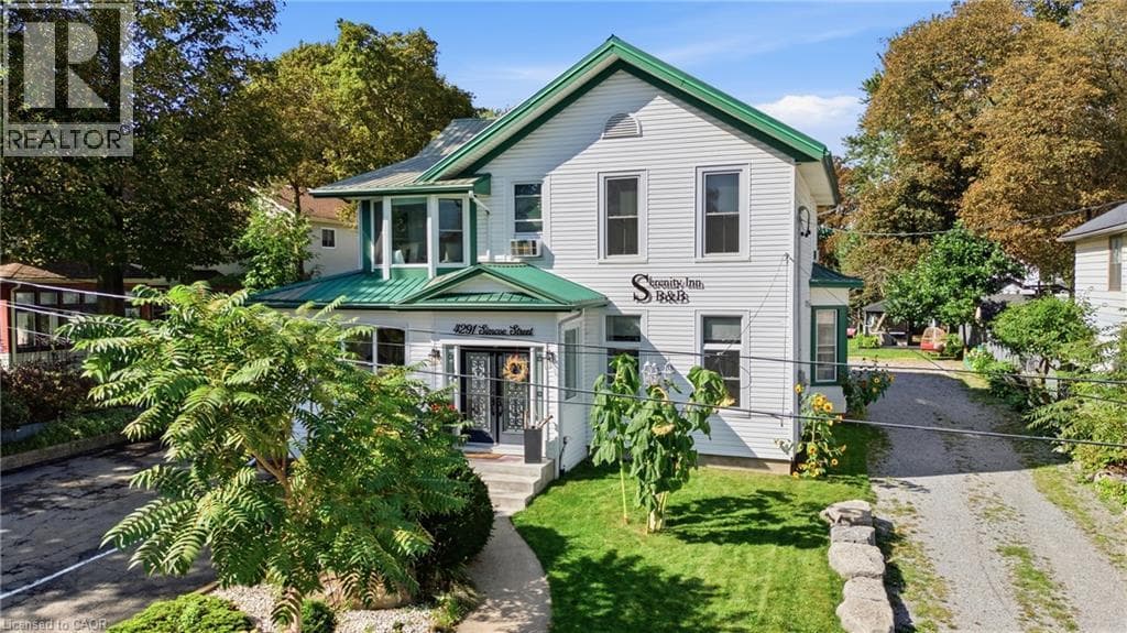 Single Family at 4291 SIMCOE Street, Niagara Falls, Ontario - Photo 4 - RE/MAX Garden City Realty