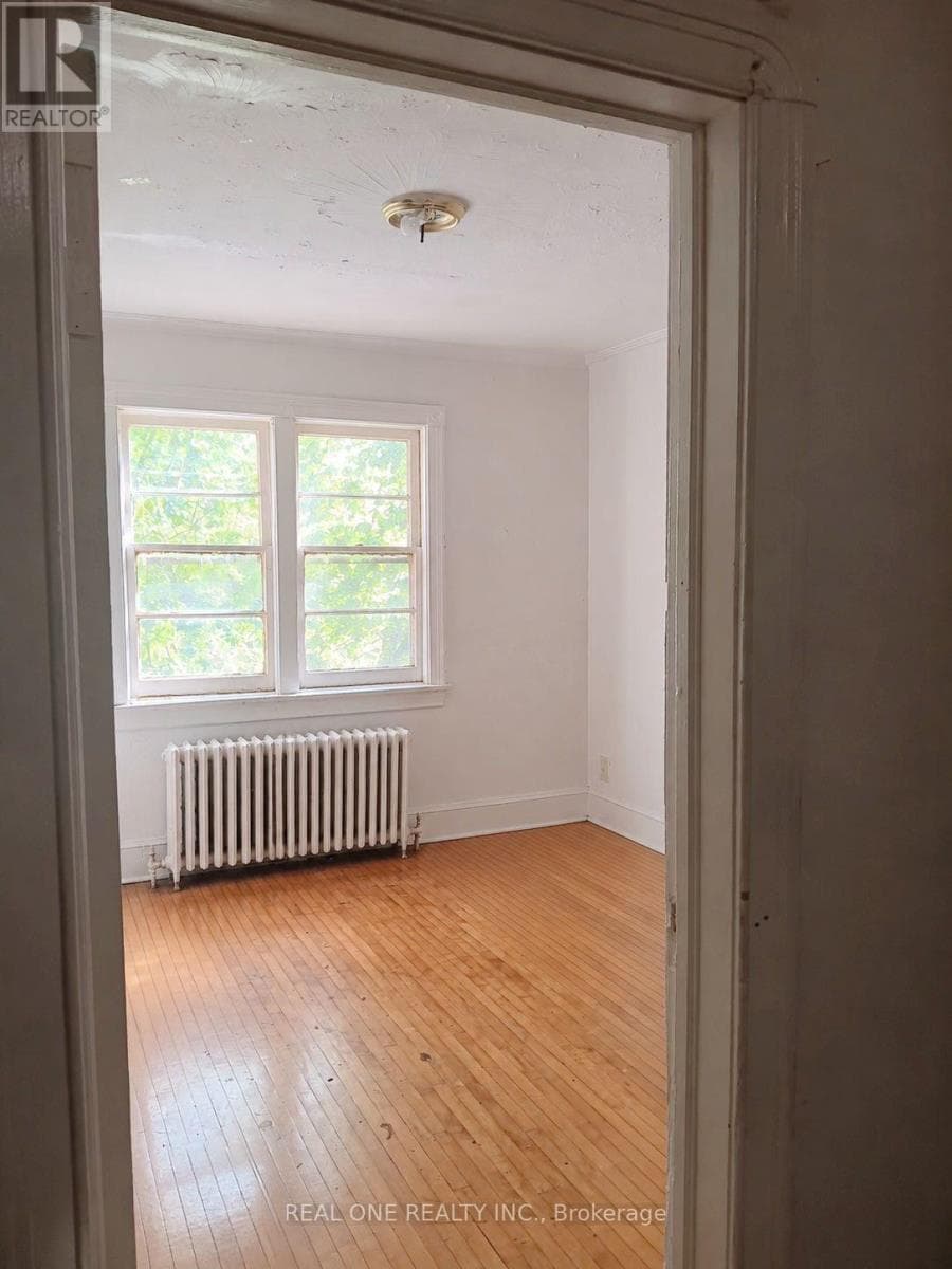 Multi-family at 2- 104 Twenty Fifth Street, Toronto (Long Branch), Ontario - Photo 3 - RE/MAX Garden City Realty